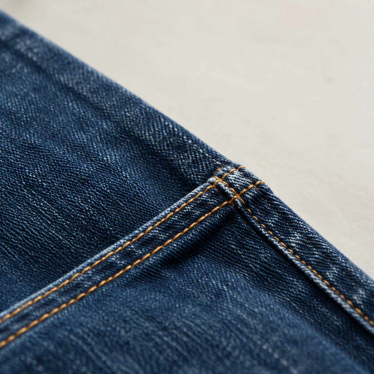 Close-up of denim weave and stitching